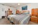 Bedroom with double bed, dresser, and ceiling fan at 2700 Magdalina Dr # 2B, Punta Gorda, FL 33950