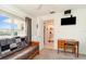 Cozy bedroom with a view of the kitchen and built-in desk at 2700 Magdalina Dr # 2B, Punta Gorda, FL 33950