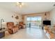 Living room with patio doors leading to water view at 2700 Magdalina Dr # 2B, Punta Gorda, FL 33950