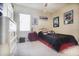 Bright bedroom with a double bed and a dresser at 3011 Marble Crest Dr, Land O Lakes, FL 34638