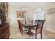 Formal dining room with wood table and chairs at 3011 Marble Crest Dr, Land O Lakes, FL 34638