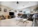 Relaxing game room featuring comfortable seating and a large TV at 3011 Marble Crest Dr, Land O Lakes, FL 34638