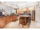 Kitchen with island, stainless steel appliances, and wood cabinets at 3011 Marble Crest Dr, Land O Lakes, FL 34638