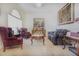Living room with two armchairs and a coffee table at 3011 Marble Crest Dr, Land O Lakes, FL 34638