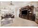 Living room with large entertainment center at 3011 Marble Crest Dr, Land O Lakes, FL 34638