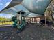 Shaded playground with climbing structures and slides at 3011 Marble Crest Dr, Land O Lakes, FL 34638