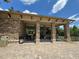 Covered patio area with seating near the pool at 3011 Marble Crest Dr, Land O Lakes, FL 34638