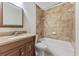 Clean bathroom with a shower/tub combo and updated vanity at 304 S Habana Ave # A3, Tampa, FL 33609