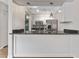 Modern kitchen with stainless steel appliances and granite countertops at 304 S Habana Ave # A3, Tampa, FL 33609