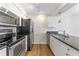 Modern kitchen with stainless steel appliances and granite countertops at 304 S Habana Ave # A3, Tampa, FL 33609