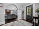 Bright entryway with arched doorway leading to living room at 319 26Th W St, Bradenton, FL 34205