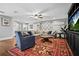 Spacious living room with sectional sofa, coffee table, and area rug at 319 26Th W St, Bradenton, FL 34205
