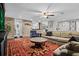 Spacious living room with sectional sofa, coffee table, and area rug at 319 26Th W St, Bradenton, FL 34205