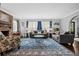 Living room with fireplace and comfortable seating area at 319 26Th W St, Bradenton, FL 34205