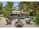 Inviting pool area with fire pit and lounge chairs at 319 26Th W St, Bradenton, FL 34205