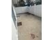 Small backyard with a concrete patio and white fence at 3553 Center Cir, Largo, FL 33774