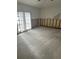 Large bedroom with French doors and needs renovation at 3553 Center Cir, Largo, FL 33774