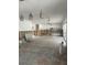 Living room with damaged walls and exposed framing at 3553 Center Cir, Largo, FL 33774