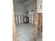 Unfinished mechanical room with exposed wires and a water heater at 3553 Center Cir, Largo, FL 33774