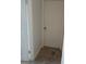 Interior hallway with carpet and doors at 3602 Cambridge W Dr, Bradenton, FL 34205