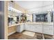 Double vanity bathroom with a large mirror and white cabinets at 3704 Berger Rd, Lutz, FL 33548