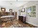 Luxurious bathroom with marble floors, a large soaking tub, and a double vanity at 3704 Berger Rd, Lutz, FL 33548