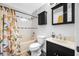 Clean bathroom with tub, shower, and updated vanity at 3704 Berger Rd, Lutz, FL 33548