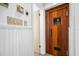 Small bathroom with wooden sauna door at 3704 Berger Rd, Lutz, FL 33548