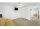 Bright bedroom with a large closet, neutral walls, and plush carpeting at 3704 Berger Rd, Lutz, FL 33548