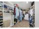 Walk-in closet with plenty of shelving and hanging space at 3704 Berger Rd, Lutz, FL 33548