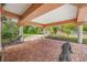 Brick paved covered patio with ornate lion statues at 3704 Berger Rd, Lutz, FL 33548