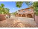 Double garage with brick-paved driveway and gated entrance at 3704 Berger Rd, Lutz, FL 33548