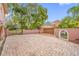 Brick-paved driveway with gated entrance and attached garage at 3704 Berger Rd, Lutz, FL 33548