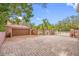 Brick-paved driveway with double garage and gated entrance at 3704 Berger Rd, Lutz, FL 33548