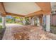 Covered entryway with brick pavers and columns at 3704 Berger Rd, Lutz, FL 33548