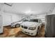 Two-car garage with tiled flooring and ample space at 3704 Berger Rd, Lutz, FL 33548