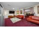 Spacious home theater with seating for multiple people and a large projection screen at 3704 Berger Rd, Lutz, FL 33548