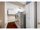 Laundry room with washer, dryer and storage cabinets at 3704 Berger Rd, Lutz, FL 33548