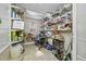 Well-stocked pantry with ample shelving for storage at 3704 Berger Rd, Lutz, FL 33548