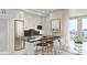 Modern kitchen with marble countertops and island at 411 E Shore Drive # 411, Clearwater Beach, FL 33767