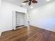 Light and airy bedroom featuring hardwood floors and closet with adjustable shelves at 4219 4Th S Ave, St Petersburg, FL 33711