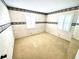 Bright bedroom with neutral carpeting and mirrored closet doors at 5265 E Bay Dr # 410, Clearwater, FL 33764