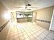Bright dining area with tiled floor and mirrored wall at 5265 E Bay Dr # 410, Clearwater, FL 33764
