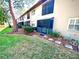 Exterior view showing building and landscaped grounds at 5265 E Bay Dr # 410, Clearwater, FL 33764