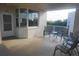 Private balcony with outdoor seating and partial view at 6315 Shoreline Dr # 3208, St Petersburg, FL 33708