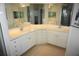 Double vanity bathroom with large mirror and ample storage at 6315 Shoreline Dr # 3208, St Petersburg, FL 33708