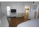 Bedroom with TV, desk, and access to balcony at 6315 Shoreline Dr # 3208, St Petersburg, FL 33708
