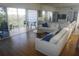 Living room with sectional sofa and access to a waterfront balcony at 6315 Shoreline Dr # 3208, St Petersburg, FL 33708