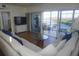 Living room with sectional sofa, coffee table, and access to a balcony at 6315 Shoreline Dr # 3208, St Petersburg, FL 33708