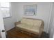Small office with wicker couch and window at 6315 Shoreline Dr # 3208, St Petersburg, FL 33708